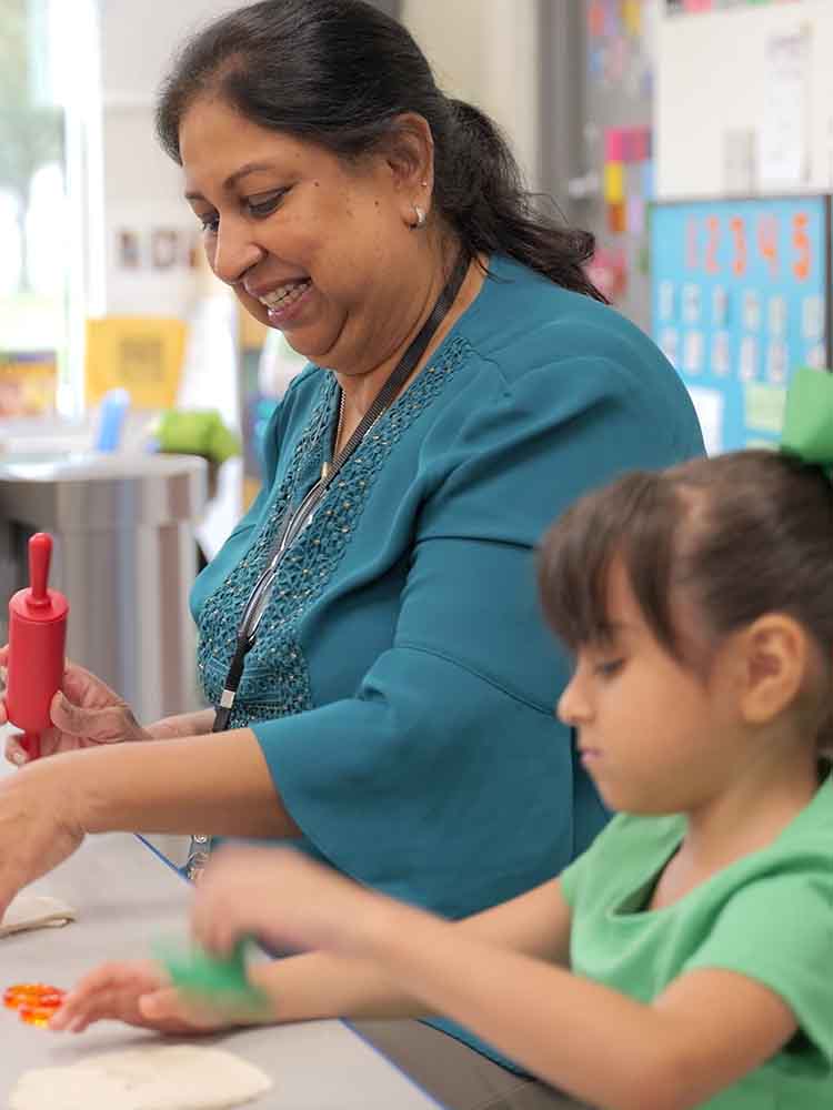 teacher playing with student