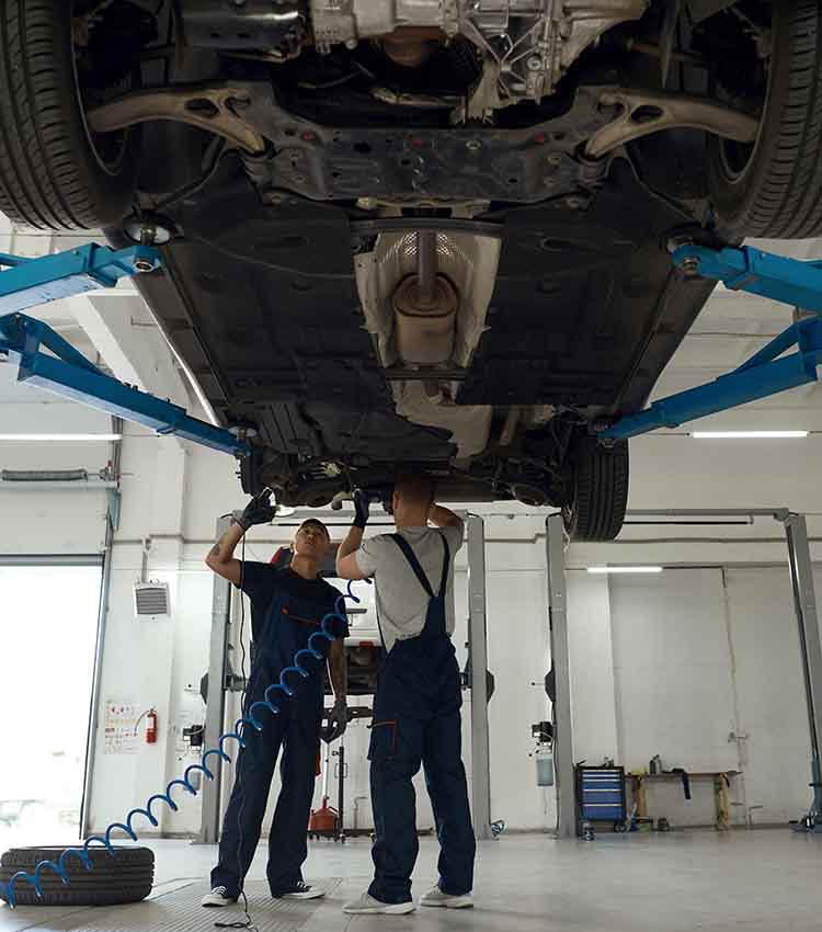 gm mechanic working on a gmc car