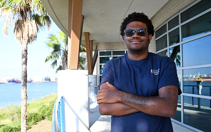 Michael Riggs standing outside San Jacinto College Maritime Campus