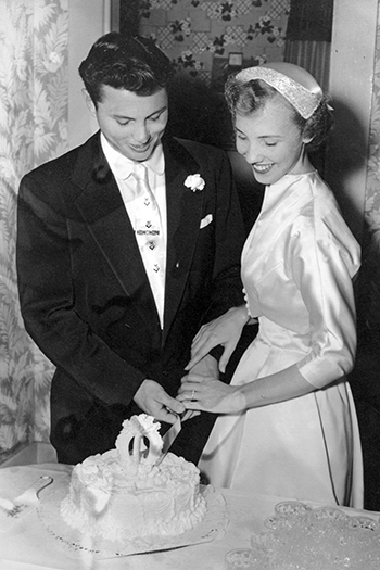 The newlyweds slice their wedding cake in 1954. (Photo courtesy of Black Family)
